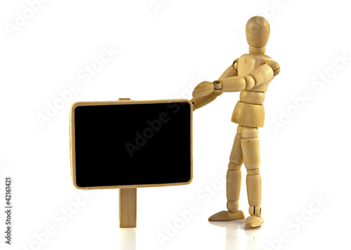 wooden puppet with blackboard