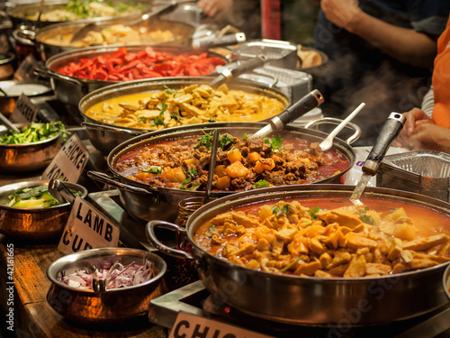 Billede på lærred Oriental food - Indian takeaway at a London's market