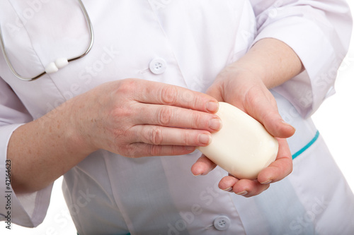 soap in the hands of a doctor