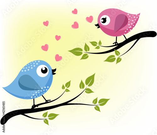 Two loving birds on the branches