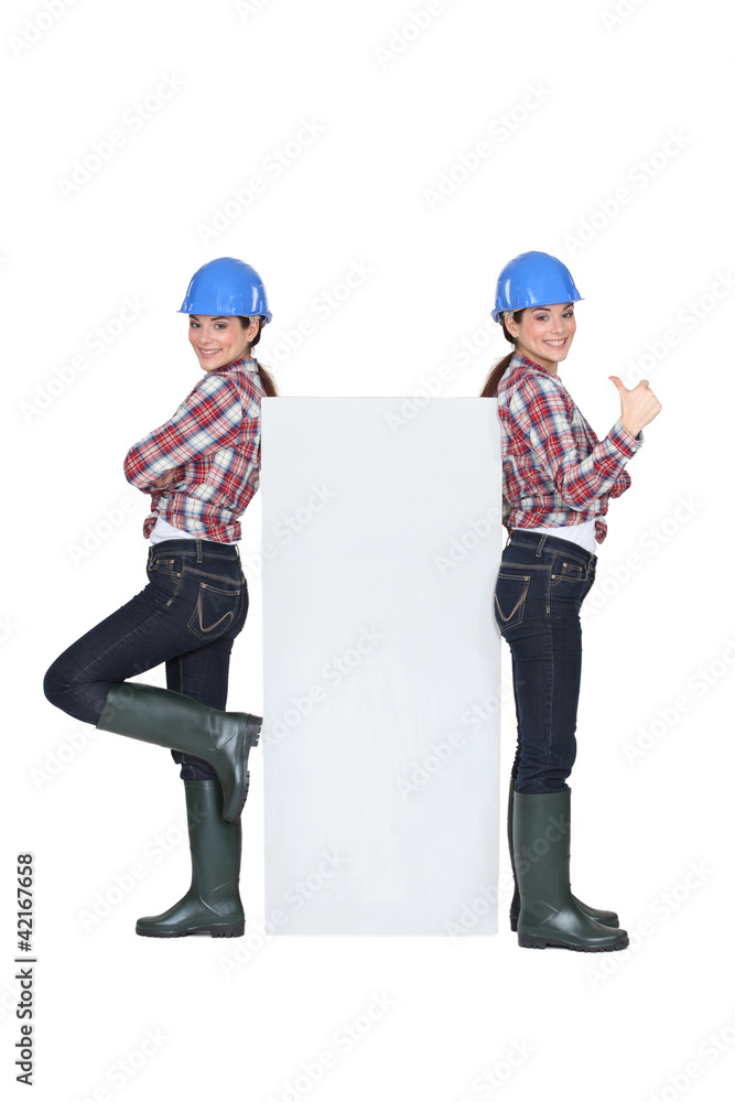 Mirror image of female builder Mirror image of female builder
