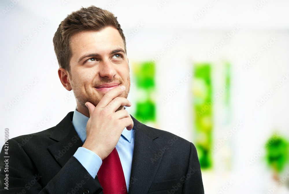 Young businessman having an idea Young businessman having an idea