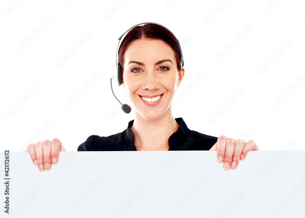 Attractive help-desk female holding blank placard Attractive help-desk female holding blank placard