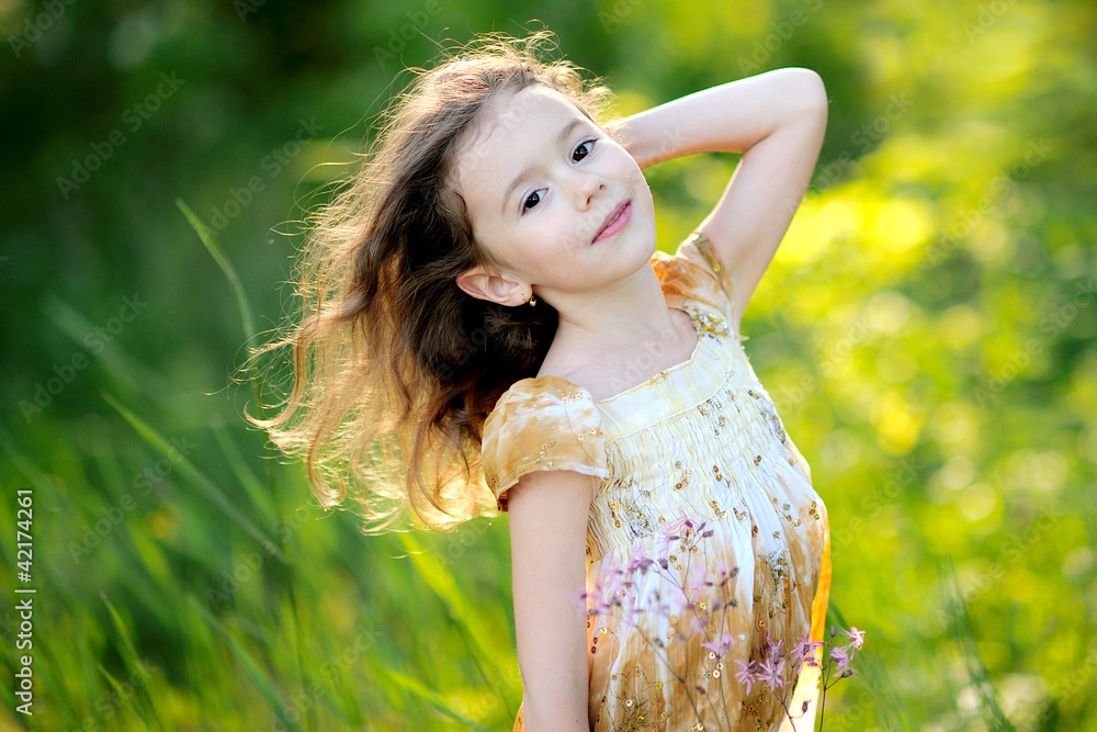 portrait of little girl outdoors in summer Stock Photo | Adobe Stock