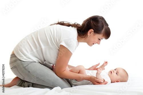 joyful mother playing with ...