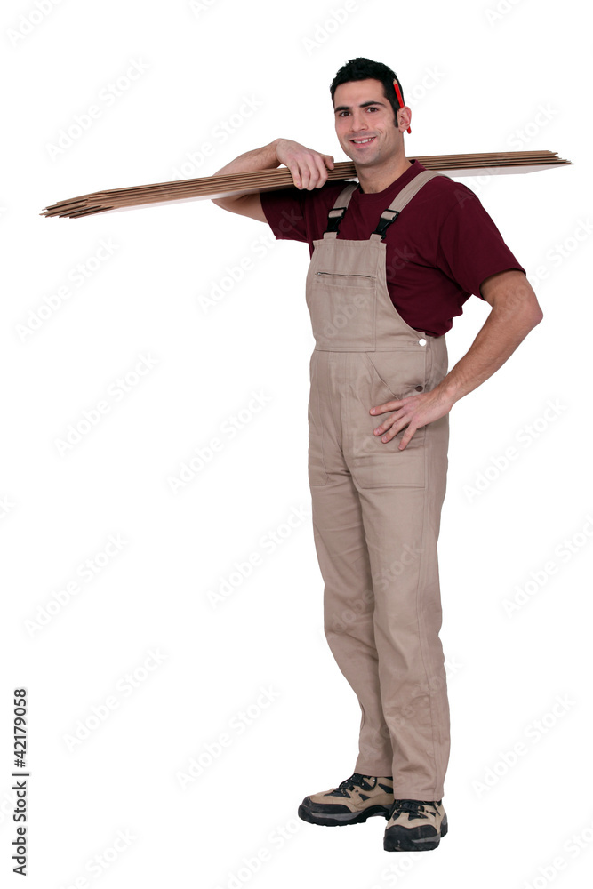 Happy woodworker standing on white background Happy woodworker standing on white background