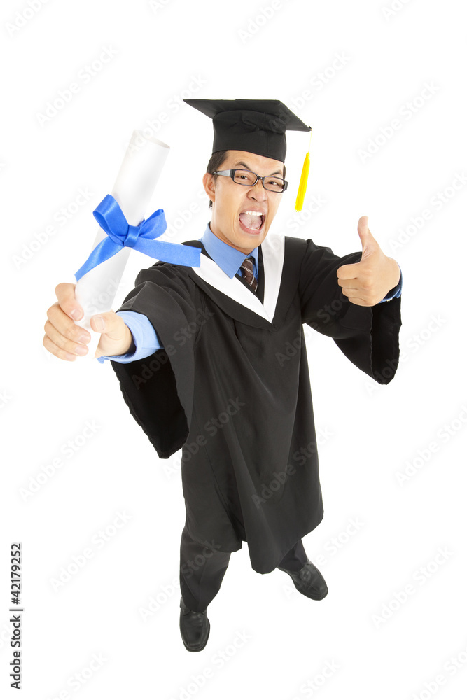 excited graduating student with thumbs up excited graduating student with thumbs up