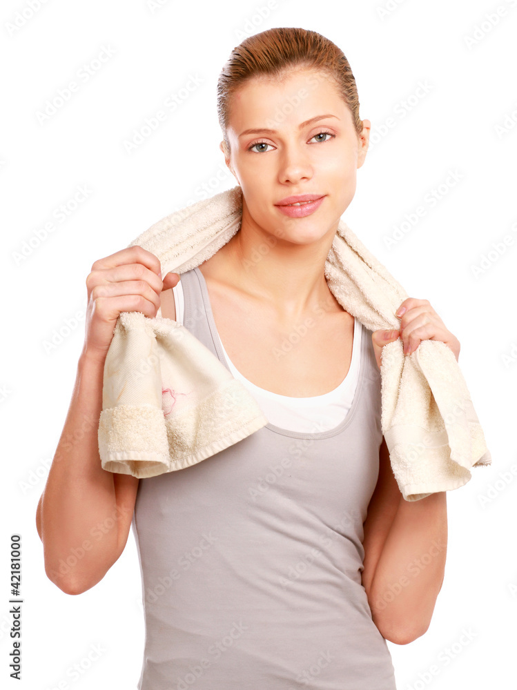 A young woman with a towel, isolated on white background A young woman with a towel, isolated on white background