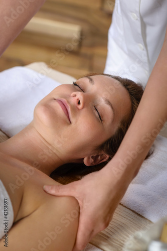 Woman neck massage at luxury spa