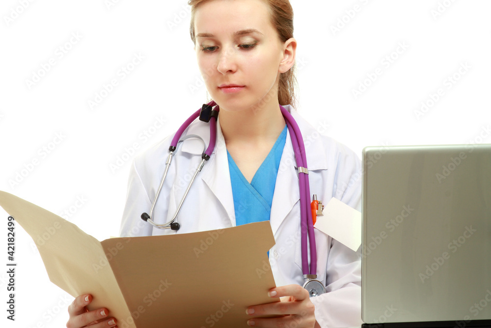 Doctor with stethoscope at her working place Doctor with stethoscope at her working place
