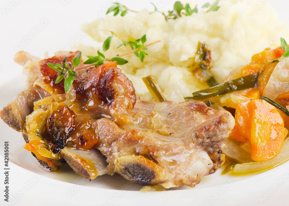 Veal ribs with mashed potato and vegetables Veal ribs with mashed potato and vegetables