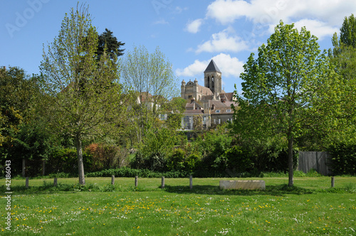 France, church and village of Vetheuil in Val d Oise photo