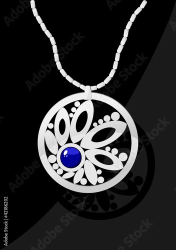 Elegant jewel with blue stone on black background.