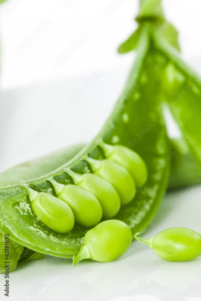 Close up of split sweet pea arranged on white background