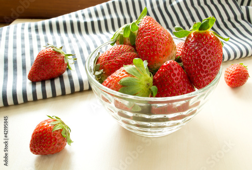 Strawberries in a glass on the table