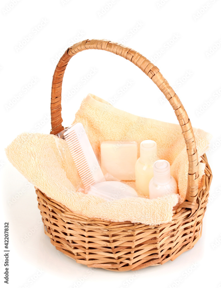 Hotel amenities kit in basket isolated on white Hotel amenities kit in basket isolated on white