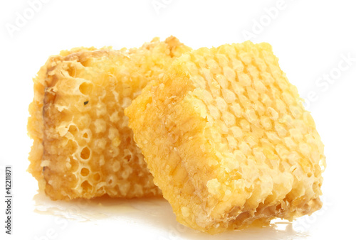 golden honeycombs isolated on white.