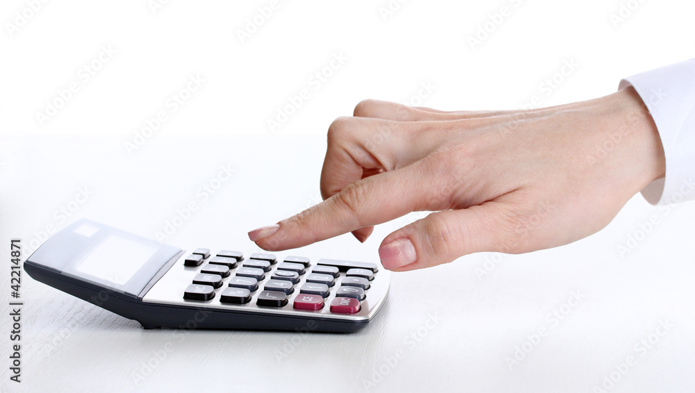 women hand and Calculator isolated on white women hand and Calculator isolated on white