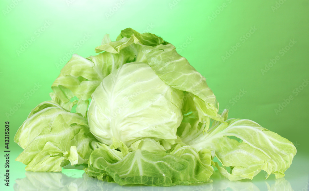 Cabbage on bright green background Cabbage on bright green background