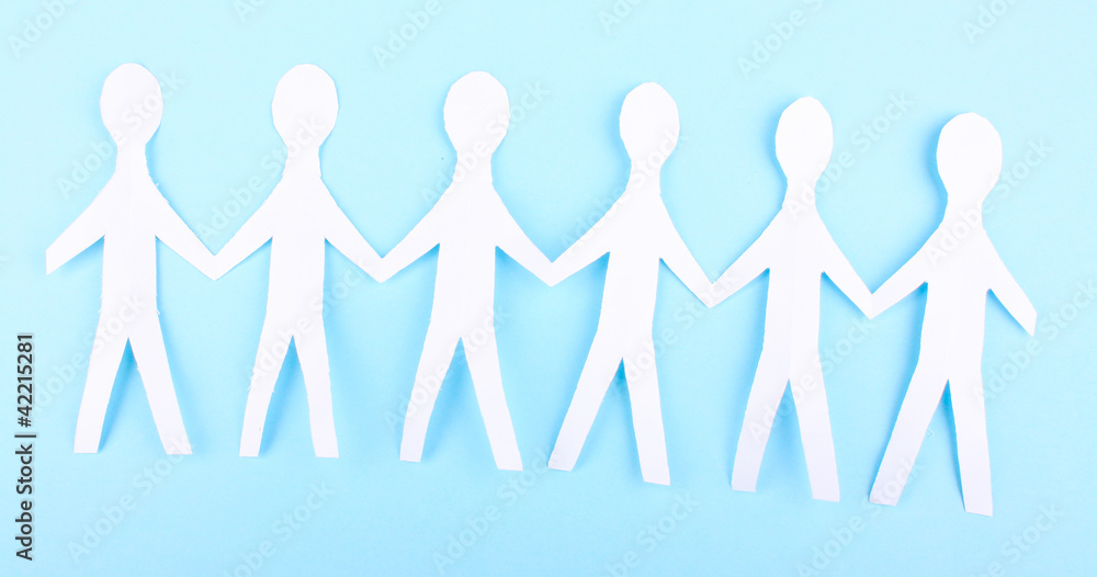 Paper people on blue background Paper people on blue background