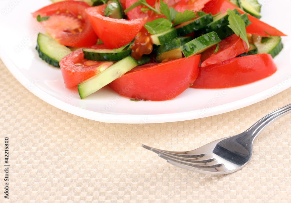 Fresh salad with tomatoes and cucumbers Fresh salad with tomatoes and cucumbers