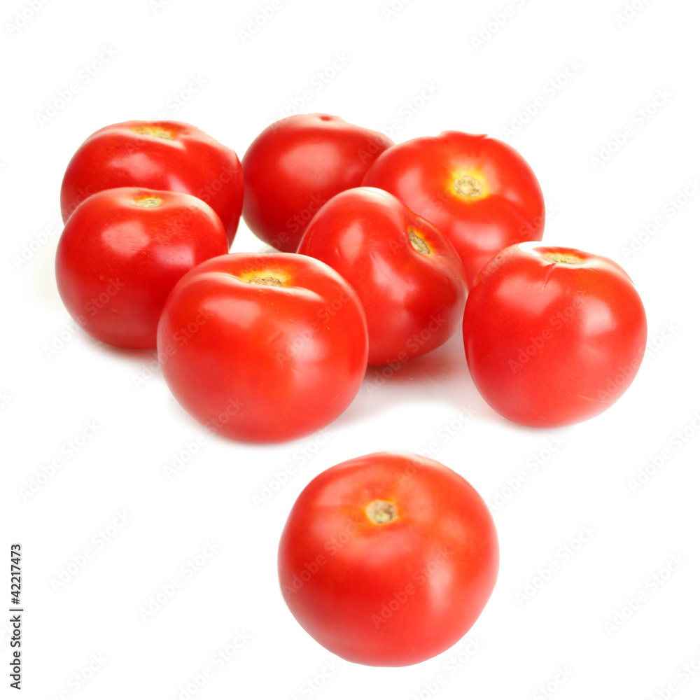 Ripe red tomatoes isolated on white Ripe red tomatoes isolated on white