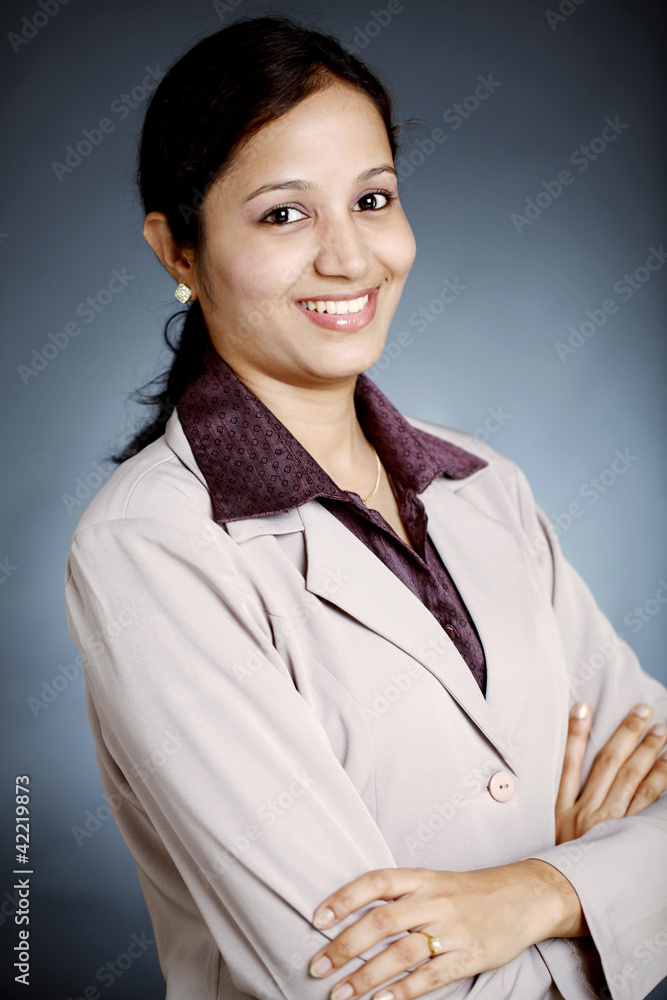 Confident businesswoman with arms crossed Confident businesswoman with arms crossed