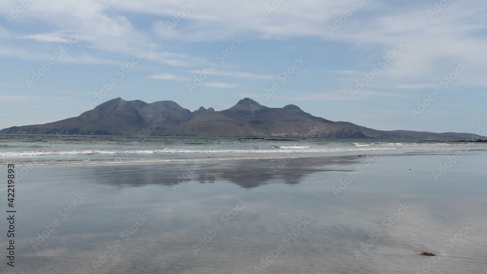 Isle of Rum viewed from Bay of Laig Eigg Scotland Isle of Rum viewed from Bay of Laig Eigg Scotland