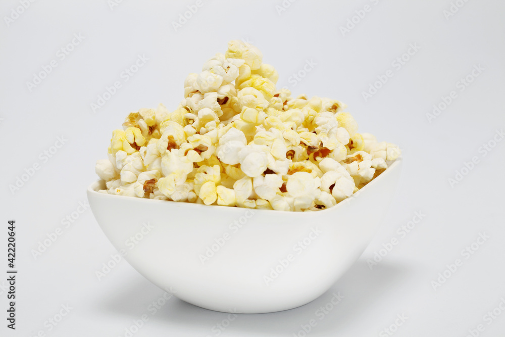 Bowl of popcorn isolated on white background Bowl of popcorn isolated on white background