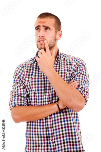 Portrait of a pensive young man, isolated on white