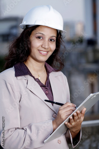 Young female construction engineer