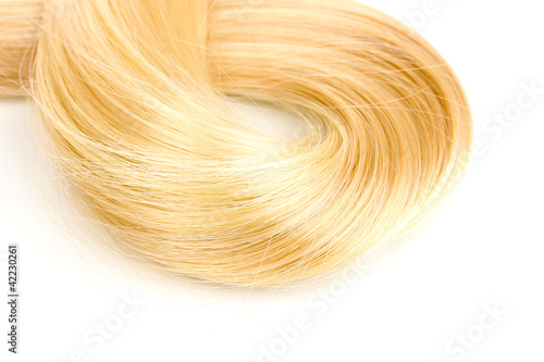 Shiny blond hair isollated on white