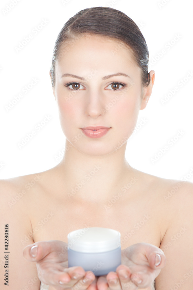 Beautiful young brunette girl with facial cream Beautiful young brunette girl with facial cream
