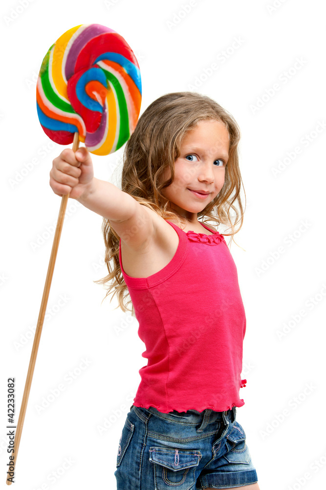 Cute girl holding candy stic.