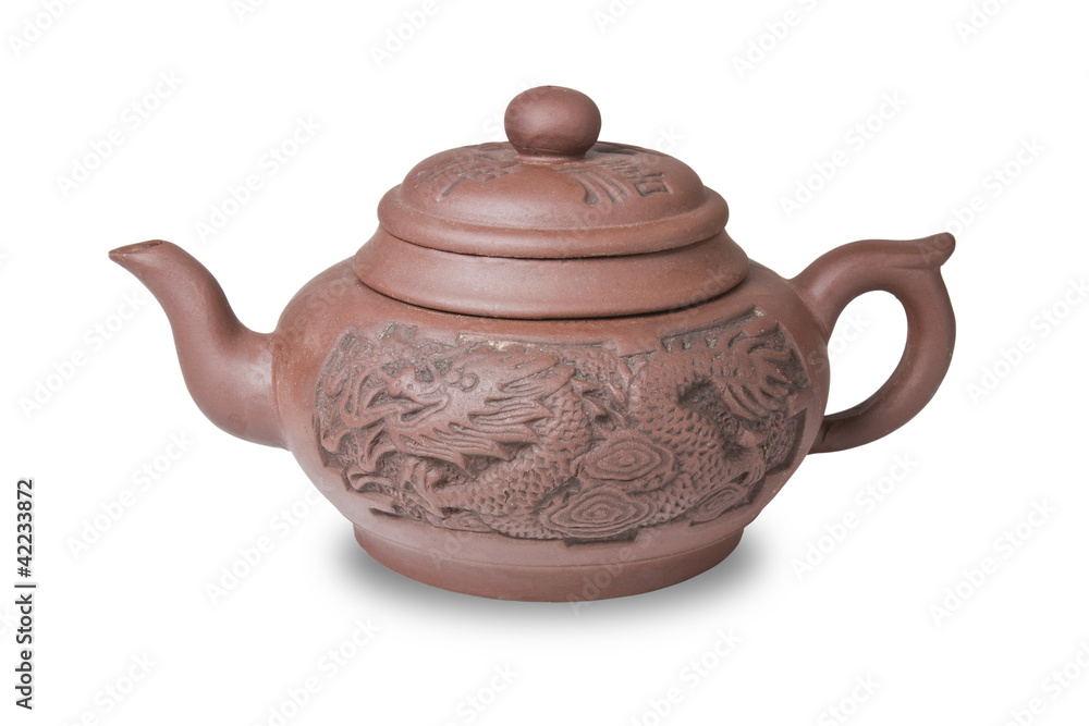 Earthenware teapot isolated on white background Earthenware teapot isolated on white background