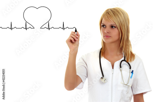 Female doctor drawing a heartbeat photo