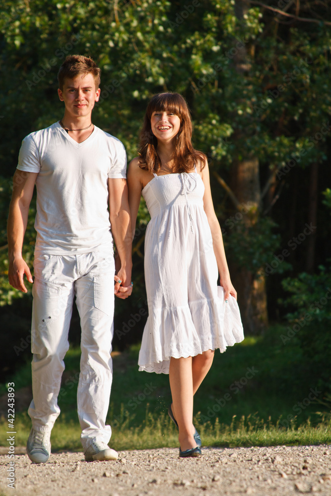 Fototapeta premium Couple walking outdoors together