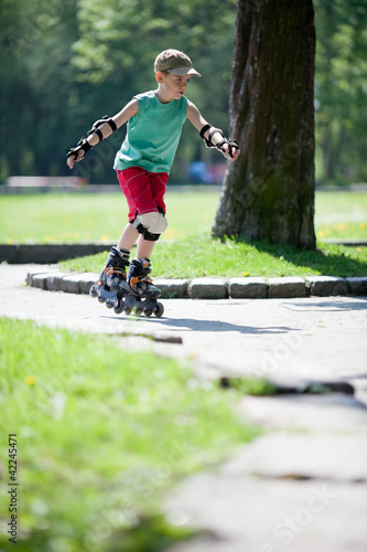 Wallpaper Mural Little boy on rollerblades Torontodigital.ca