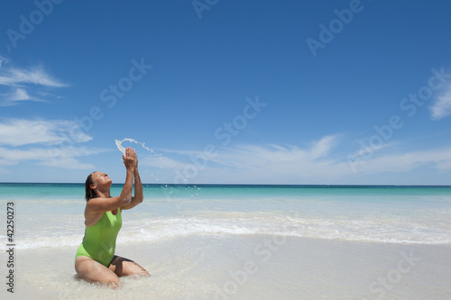 Sexy woman at paradise beach holiday