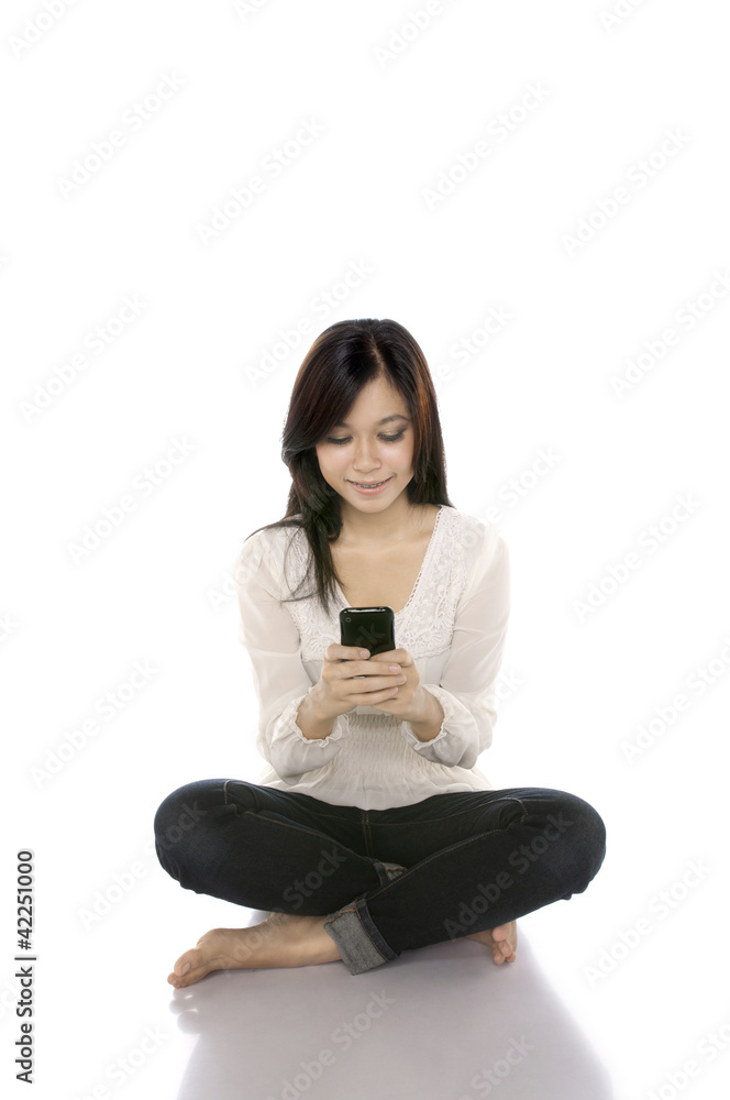 Woman Texting On Her Cell