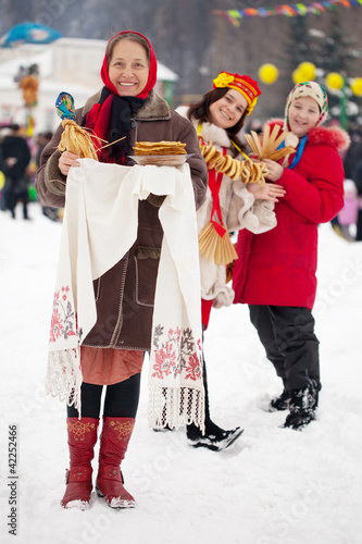 Women with pancake during Maslenitsa festival
