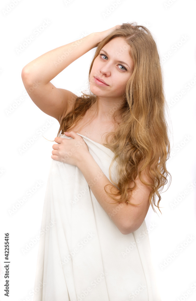 A beautiful nude woman, covered with white cloth. A beautiful nude woman, covered with white cloth.