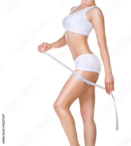 Woman Measuring Her Perfect Body. Healthy lifestyle concept