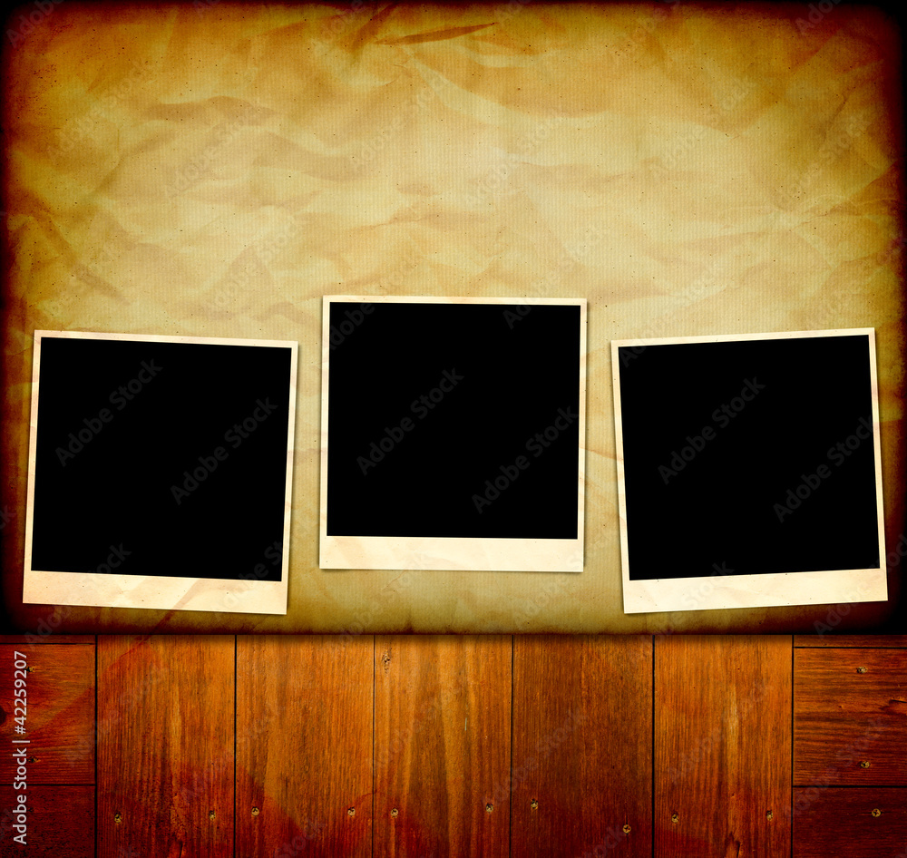 Fototapeta premium Vintage Pictures on Wooden Old Table