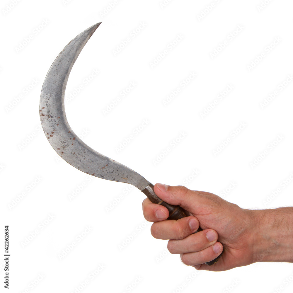 Fotografie Man holding a rusted sickle