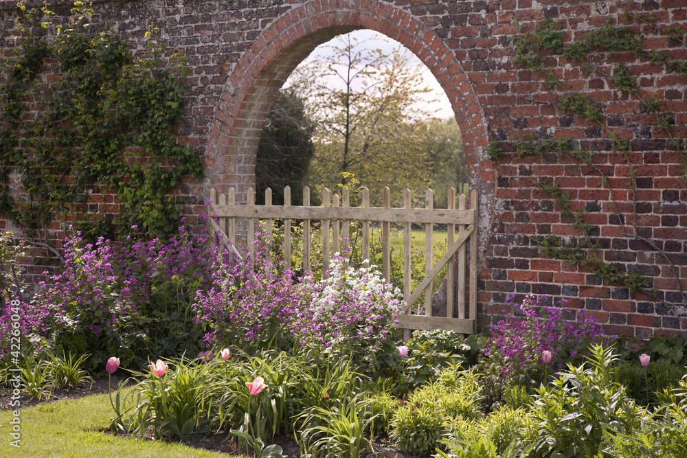 Fototapeta English Garden Border & Old Brick Arch