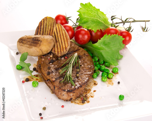Grilled beef steak with american potatoes