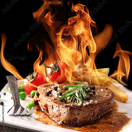 Grilled meat with fire flames #42267668