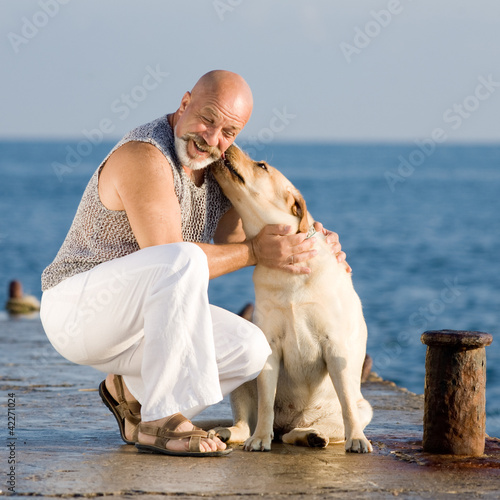 Man of middle age with dog