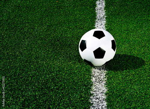 Soccer ball on green grass © Neung Stockr